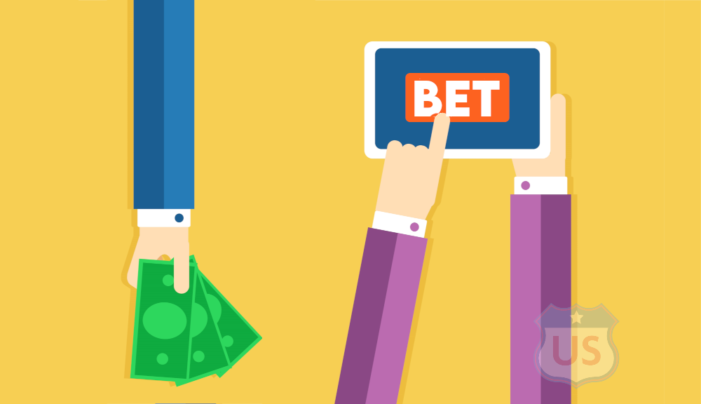 Illustration of a hand holding a tablet and pressing a button that says "BET" and another hand reaching with money, to give to the hand placing the bets, representing the Florida man who had a friend in new jersey place illegal bets on his behalf.
